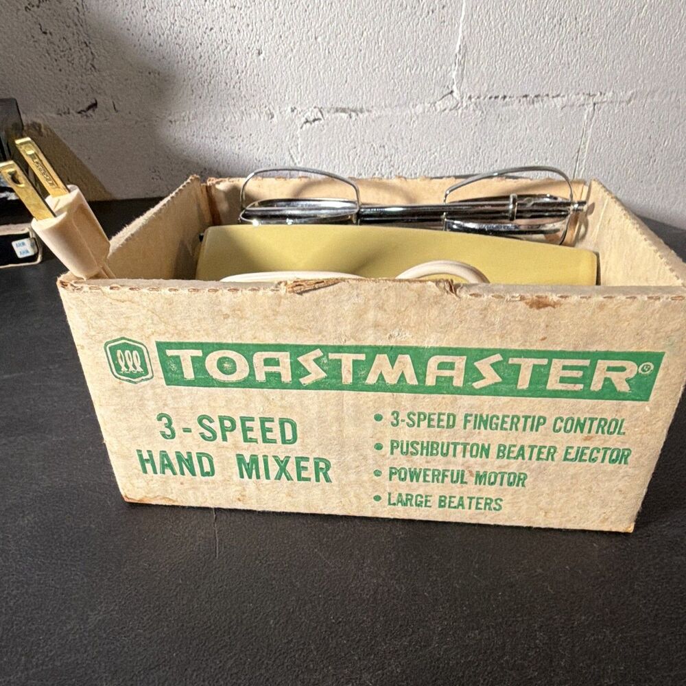 Toastmaster 1706 3-Speed Yellow Handheld Mixer w/ Beaters, Beater Ejector 120V